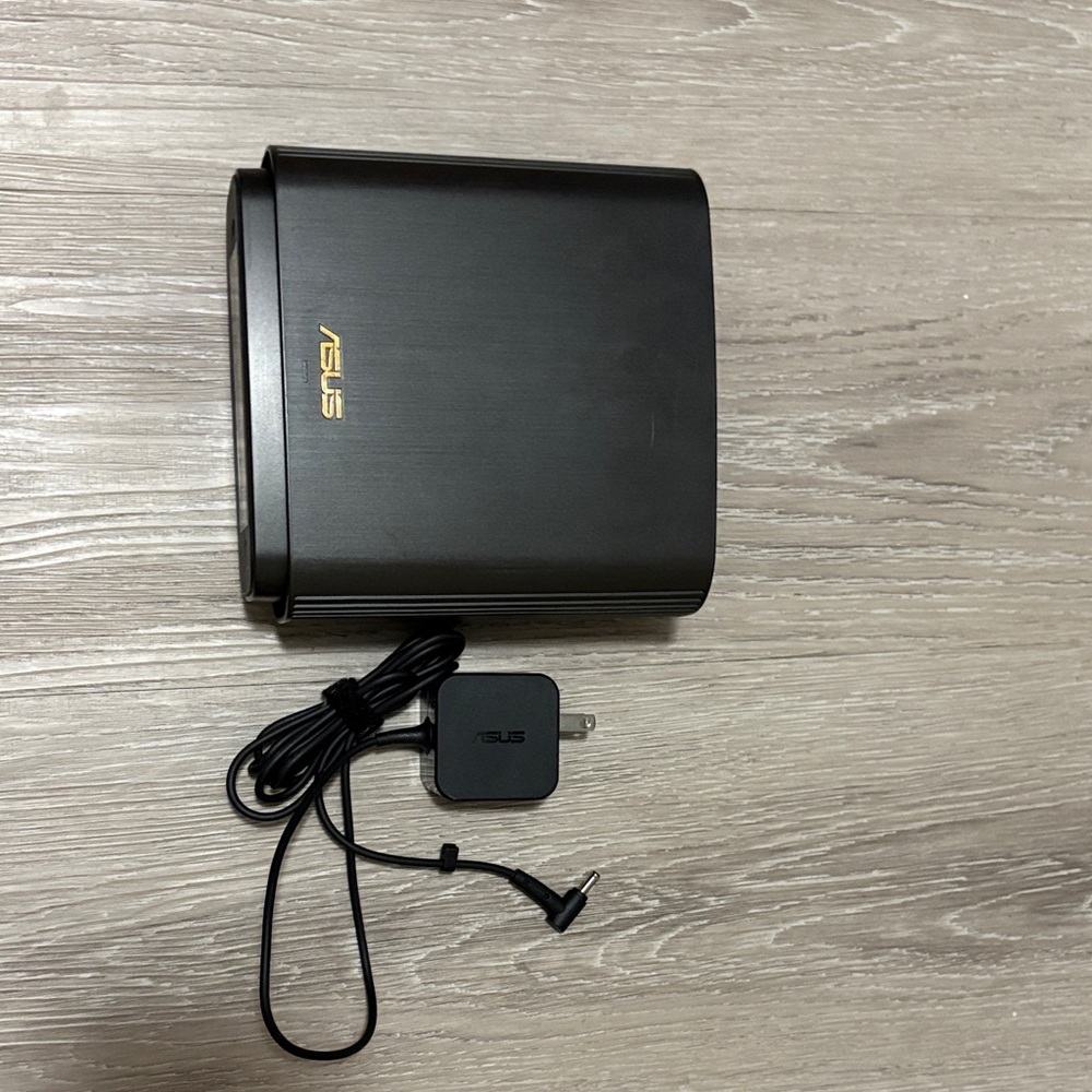 ASUS Black Router with Gold Logo